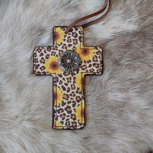 Custom leather Saddle or Rear View mirror Cross